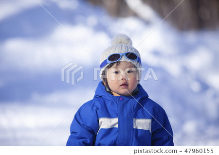 Children playing in the snow 47960155