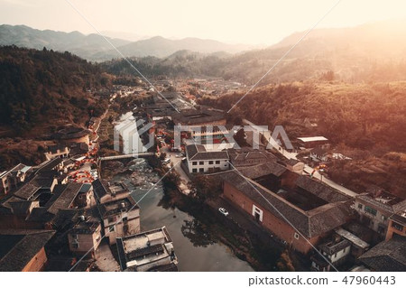 Fujian Tulou aerial view sunset Fujian Tulou aerial view sunset 47960443