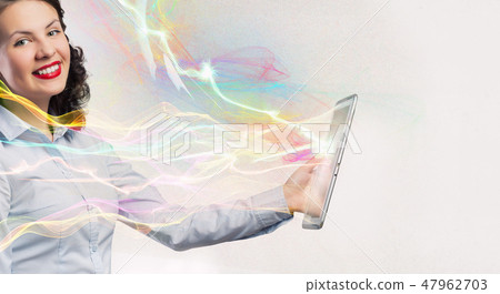 Woman use tablet device 47962703
