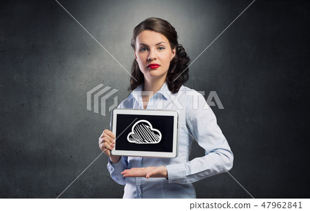 Woman use tablet device Woman use tablet device 47962841
