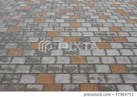 Paved sidewalk with blocks 47964751
