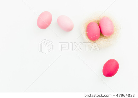 Easter egg with nest on white background, Top view 47964858