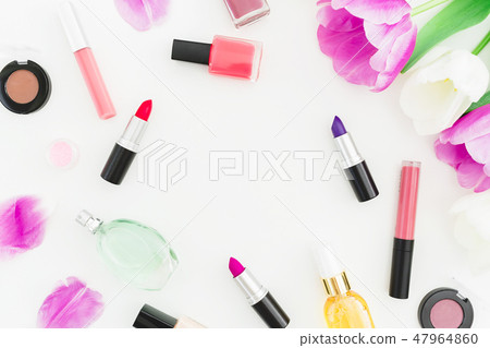 Frame made of tulips flowers and cosmetics 47964860