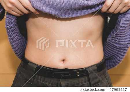 Women's stomach Women's stomach 47965337
