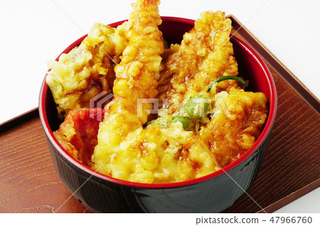 Bowl of rice and fried fish 47966760