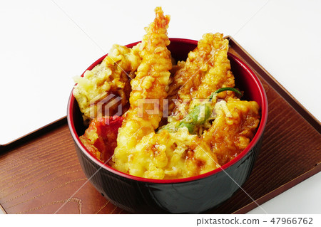 Bowl of rice and fried fish 47966762