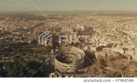 Aerial view of famous Colosseum or Coliseum amphitheatre within cityscape of Rome, Italy Aerial view of famous Colosseum or Coliseum amphitheatre within cityscape of Rome, Italy 47968566