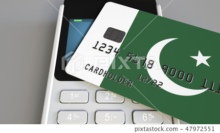 Payment terminal with credit card featuring flag of Pakistan. Pakistani national banking system Payment terminal with credit card featuring flag of Pakistan. Pakistani national banking system 47972551