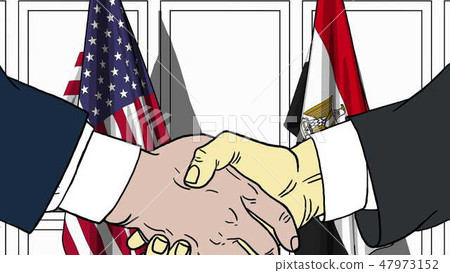 Businessmen or politicians shake hands against flags of USA and Egypt. Official meeting or Businessmen or politicians shake hands against flags of USA and Egypt. Official meeting or 47973152