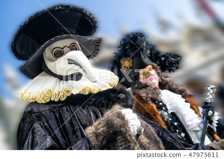 People in costumes at Venice carneval 47973611