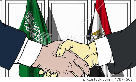 Businessmen or politicians shake hands against flags of Saudi Arabia and Egypt. Official meeting or 47974505