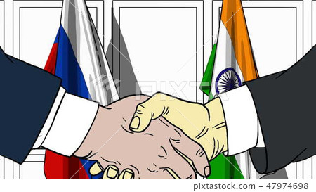 Businessmen or politicians shaking hands against flags of Russia and India. Meeting or cooperation 47974698