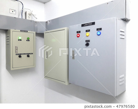 Three electric power control box mount on the wall 47976580