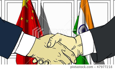 Businessmen or politicians shaking hands against flags of China and India. Meeting or cooperation Businessmen or politicians shaking hands against flags of China and India. Meeting or cooperation 47977218