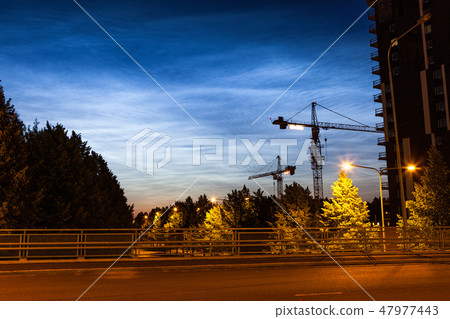 Noctilucent clouds glowing at night sky 47977443