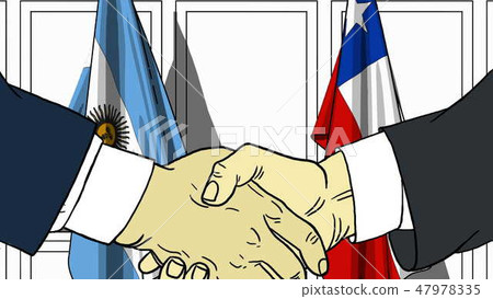 Businessmen or politicians shake hands against flags of Argentina and Chile. Official meeting or 47978335