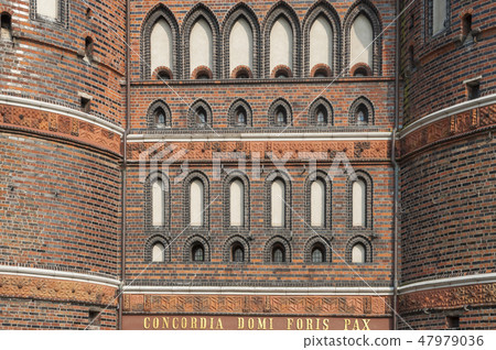 Facade of the Holsten Gate in Luebeck 47979036