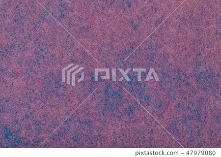 Dark purple background of felt fabric.  47979080