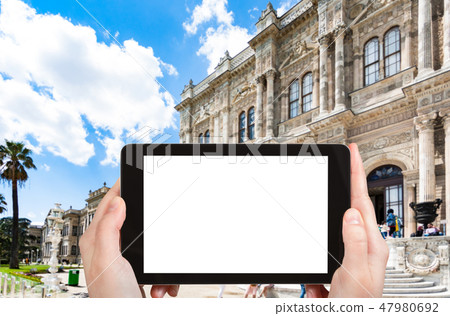 visitors near Dolmabahce Palace in Istanbul city 47980692