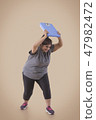 Woman Frustrated From Her Weight Throwing Scale 47982472