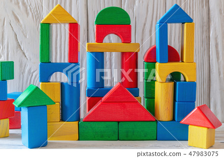 Children's wooden designer from blocks of a different form Children's wooden designer from blocks of a different form 47983075