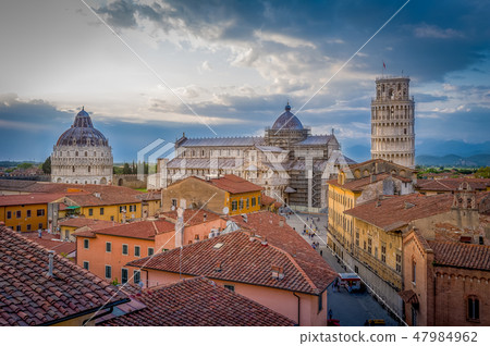 Sunset aerial view of Pisa historic center with famous leaning tower and Duomo di Pisa cathedral. 47984962