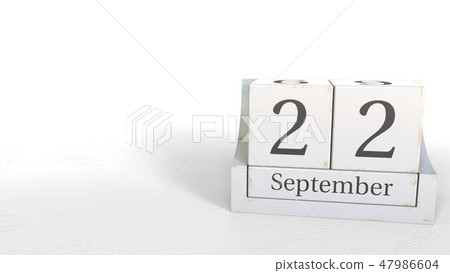 Wood cube calendar shows September 22 date, 3D rendering Wood cube calendar shows September 22 date, 3D rendering 47986604