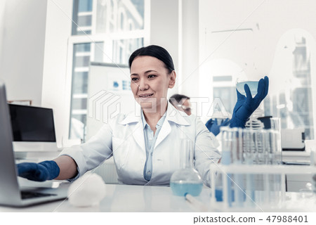 Scientist analysing the research results on the computer Scientist analysing the research results on the computer 47988401