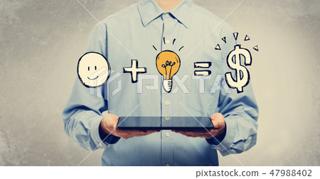 Good idea equals money with man holding a tablet Good idea equals money with man holding a tablet 47988402