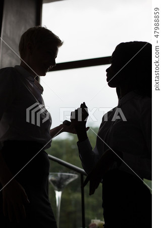 Business women stand in the hall of the business center 47988859