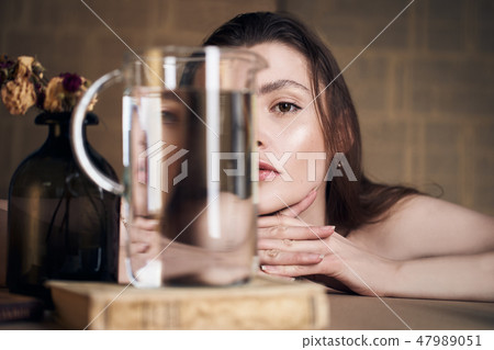 Beauty portrait of girl with water and reflections. Hight quality retouching photo. Fashion model Beauty portrait of girl with water and reflections. Hight quality retouching photo. Fashion model 47989051