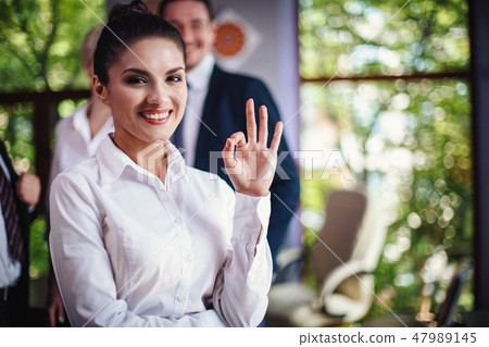 Young business woman in the office at the negotiations 47989145
