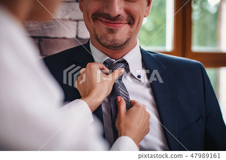 Business woman is flirting with a business man Business woman is flirting with a business man 47989161