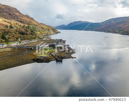 Aerial view of the historic Eilean Donan Castle by Dornie in autumn, Scotland 47990013