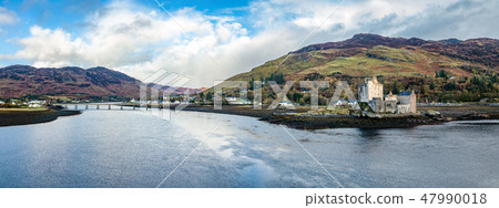 Aerial view of the historic Eilean Donan Castle by Dornie in autumn, Scotland 47990018