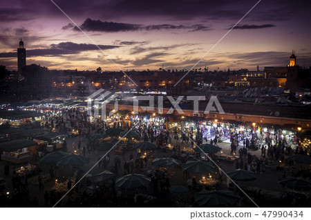 Market square in Marrakesh in Morocco at sundown Market square in Marrakesh in Morocco at sundown 47990434
