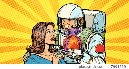 Couple in love. Astronaut gives a woman Mars 47991219
