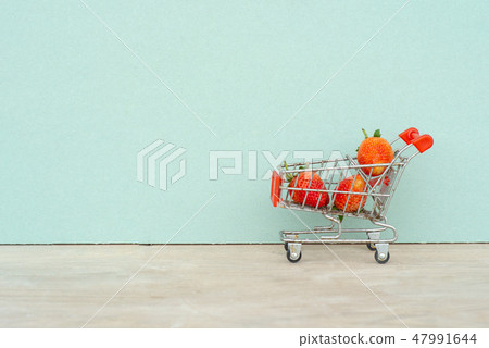 Closeup strawberries in the shopping trolley.  47991644