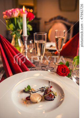 baked chicken wings with scallop, sauce and wine 47992726