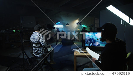 Actors shooting take of fight scene 47992919