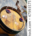 Barrel table with two glasses of wine 47993575