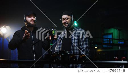 Young directors shooting a scene 47994346