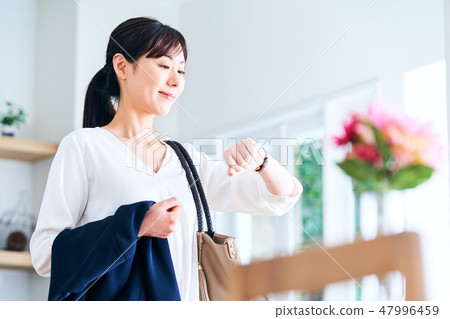 Morning of a working woman 47996459