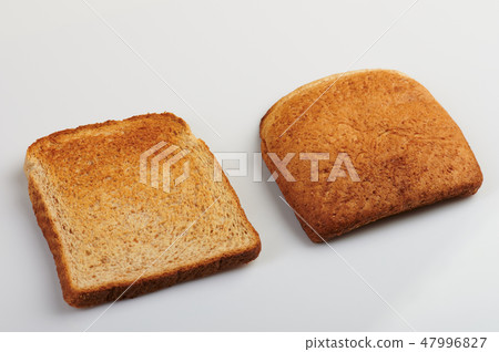 Two pieces of toasted bread 47996827