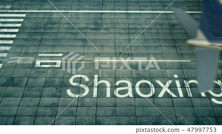 Aerial view of an airplane arriving to Shaoxing airport. Travel to China 3D rendering 47997753
