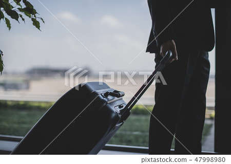 airport, business man, overseas business trip 47998980