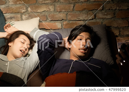 Couples suffering from snoring Couples suffering from snoring 47999820