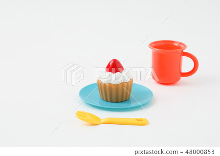 Children's play toy cake cup and cup on white background Children's play toy cake cup and cup on white background 48000853