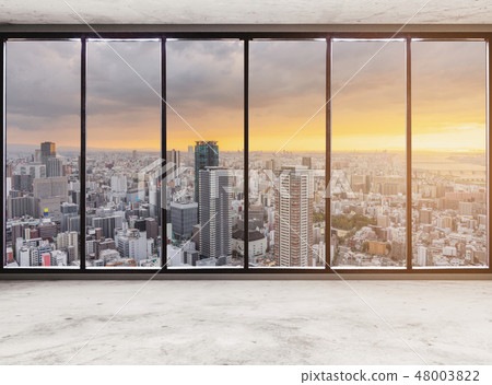 Empty modern interior space with city sunrise 48003822