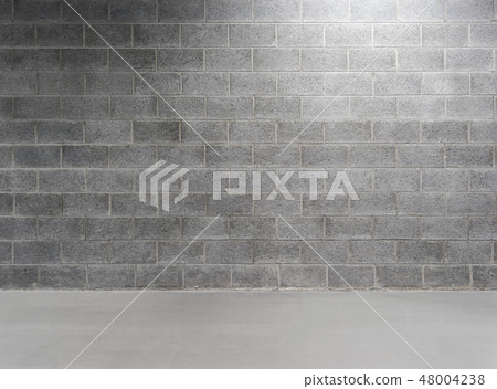 Empty concrete floor with brick wall 48004238